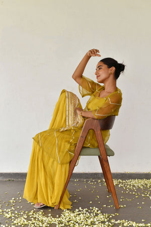 Yellow Georgette Spaghetti Kurta with Gharara and Jacket paired with Belt.
