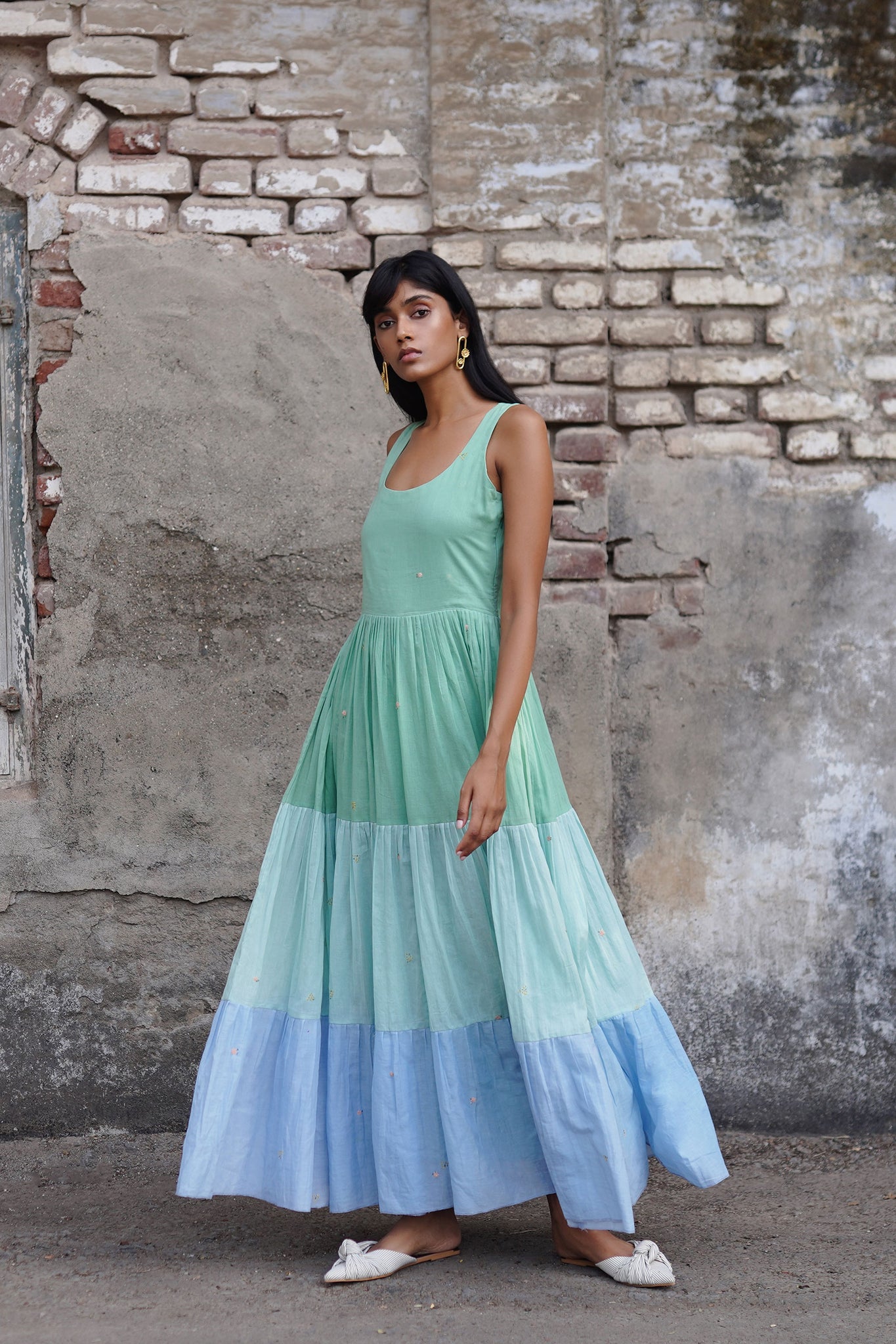 Greenish Blue Mul Tiered Maxi Dress With Small Floral Resham Motifs.